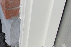 Garage door frame after repairs and exterior painting in Ottawa